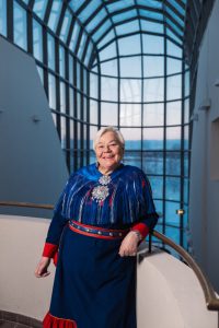 Liisa Holmberg in glass-roofed corridor of Arktikum.